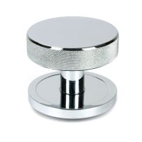 The Polished Chrome Knurled Centre Door Knob on Plain Rose Shown Upright on a White Background The Polished Chrome Knurled Centre Door Knob on Plain Rose Shown Upright on a White Background