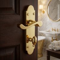 The Polished Brass Arched Backplate Bathroom Door Handle on the Door to a Luxury Bathroom - Digital Illustration