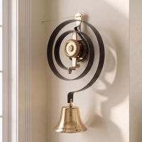 The Polished Brass Butler Door Bell Kit on a Cream Wall in an Entrance Hallway - Digital Illustration The Polished Brass Butler Door Bell Kit on a Cream Wall in an Entrance Hallway - Digital Illustration