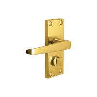 The Polished Brass Victorian Straight Bathroom Door Handles - Lever Lock Pair with Thumb Turn on a White Background