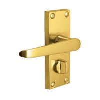 The Polished Brass Victorian Straight Bathroom Door Handles - Lever Lock Pair with Thumb Turn on a White Background