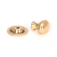 The Polished Bronze 33mm Traditional Oval Cabinet Knob with Rose on a White Background The Polished Bronze 33mm Traditional Oval Cabinet Knob with Rose on a White Background