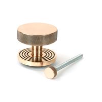 The Polished Bronze Knurled Centre Door Knob on a Beehive Rose with Bolt Fitting 