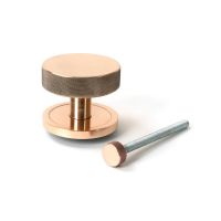 The Polished Bronze Knurled Centre Door Knob on a Plain Rose with Bolt Fitting The Polished Bronze Knurled Centre Door Knob on a Plain Rose with Bolt Fitting