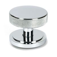 The Polished Chrome Knurled Centre Door Knob on Art Deco Rose Shown Upright on a White Background The Polished Chrome Knurled Centre Door Knob on Art Deco Rose Shown Upright on a White Background