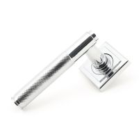 The Polished Chrome Knurled Lever on Square Rose Set on a White Background The Polished Chrome Knurled Lever on Square Rose Set on a White Background