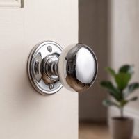 The Polished Chrome Small Mushroom Door Knobs in a Modern Apartment Setting - Digital Illustration The Polished Chrome Small Mushroom Door Knobs in a Modern Apartment Setting - Digital Illustration