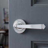 The Polished Chrome Tapered Lever on Beehive Rose Set on a Grey Door in a Home Office - Digital Illustration