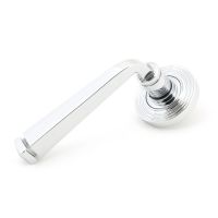 The Polished Chrome Tapered Lever on Beehive Rose Set on a White Background The Polished Chrome Tapered Lever on Beehive Rose Set on a White Background