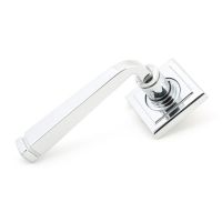 The Polished Chrome Tapered Lever on Square Rose Set on a White Background The Polished Chrome Tapered Lever on Square Rose Set on a White Background