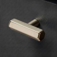 The Polished Nickel "Lexington" Hex T-Bar Cabinet Handle Mounted on a Dark Blue Kitchen Cupboard Drawer - Digital Illustration 