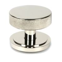 The Polished Nickel Knurled Centre Door Knob on Art Deco Rose Shown Upright on a White Background The Polished Nickel Knurled Centre Door Knob on Art Deco Rose Shown Upright on a White Background