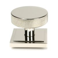 The Polished Nickel Knurled Centre Door Knob on Square Rose Shown Upright on a White Background The Polished Nickel Knurled Centre Door Knob on Square Rose Shown Upright on a White Background