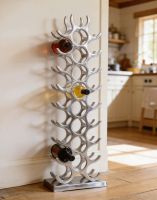 The Polished Nickel "Napa Valley" 27 Bottle Wine Rack Placed on a Polished Floor in a Country Kitchen - Digital Illustration The Polished Nickel "Napa Valley" 27 Bottle Wine Rack Placed on a Polished Floor in a Country Kitchen - Digital Illustration