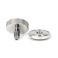 The Polished Stainless Steel Knurled Centre Door Knob on a Beehive Rose Displayed in Separate Sections 