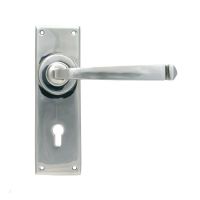 The Polished Stainless Steel Sleek Architectural Lever Lock Door Handle Set on Plain Backplate The Polished Stainless Steel Sleek Architectural Lever Lock Door Handle Set on Plain Backplate