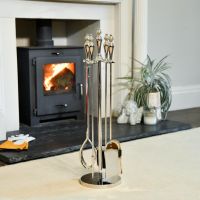 The Polished Steel Urn Style Companion Set in Front of a Modern Fireplace  - Digital Illustration