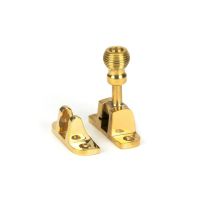 The Radiused Beehive Brighton Sash Window Fastener in Polished Brass Shown Upright The Radiused Beehive Brighton Sash Window Fastener in Polished Brass Shown Upright