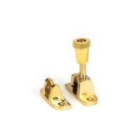 The Radiused Knurled Brighton Sash Window Fastener in Polished Brass Shown Upright The Radiused Knurled Brighton Sash Window Fastener in Polished Brass Shown Upright