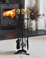 The Ravenscroft" Fireside Companion Set in a Modern Interior Setting next to a Log Burner Stove - Digital Illustration