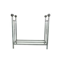 The Rectangular Fireside Log Holder with Ball Finials in Pewter Shown from the Side on a White Background
