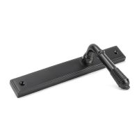 The Reeded Slimline Lever Espagnolette Door Latch in Aged Bronze Shown on its Side The Reeded Slimline Lever Espagnolette Door Latch in Aged Bronze Shown on its Side