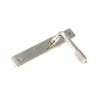 The Reeded Slimline Lever Espagnolette Door Latch in Polished Nickel Shown on its Side The Reeded Slimline Lever Espagnolette Door Latch in Polished Nickel Shown on its Side