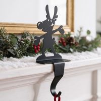 The Reindeer Stocking Holder on a Decorated Mantelpiece in a Living Room Interior - Digital Illustration The Reindeer Stocking Holder on a Decorated Mantelpiece in a Living Room Interior - Digital Illustration
