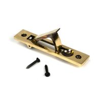 The Retractable Sliding Pocket Door Edge Pull in Aged Brass Shown in the Open position with Supplied Screws