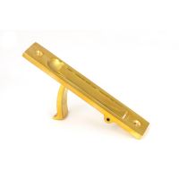 The Retractable Sliding Pocket Door Edge Pull in Polished Brass Shown Stood upright