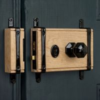 The Reversible "Northern Red" Oak & Iron 5 Lever Rim Lock and Knob Set on a Wooden Blue Entrance Door - Digital Illustration The Reversible "Northern Red" Oak & Iron 5 Lever Rim Lock and Knob Set on a Wooden Blue Entrance Door - Digital Illustration