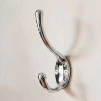 The “Rewfort Bridge” Bright Chrome Coat & Hat Hook Shown Fitted on a Cream Coloured Wall in a Modern Home - Digital Illustration 