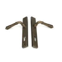 The Ribbed Slimline Exterior Door Handle in a Burnished Brass Finish Showing the Front and Back Together The Ribbed Slimline Exterior Door Handle in a Burnished Brass Finish Showing the Front and Back Together