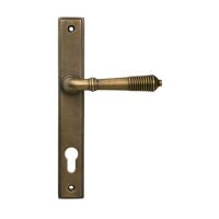 The Ribbed Slimline Exterior Door Handle in a Burnished Brass Finish Shown from Behind The Ribbed Slimline Exterior Door Handle in a Burnished Brass Finish Shown from Behind