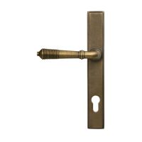 The Ribbed Slimline Exterior Door Handle in a Burnished Brass Finish Shown from the Front The Ribbed Slimline Exterior Door Handle in a Burnished Brass Finish Shown from the Front