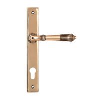 The Ribbed Slimline Exterior Door Handle in a Polished Bronze Finish Shown from the Front The Ribbed Slimline Exterior Door Handle in a Polished Bronze Finish Shown from the Front