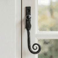 The Right Handed 16mm Beeswax Monkeytail Espagnolette Window Handle Fitted on a Traditional Window Frame in a Country Home - Digital Illustration The Right Handed 16mm Beeswax Monkeytail Espagnolette Window Handle Fitted on a Traditional Window Frame in a Country Home - Digital Illustration