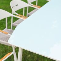 The Riviera 8-Seater Outdoor Dining Set Showing a Close up of the Glass Table Top