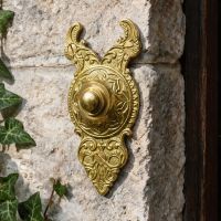 The "Rosemont Hall" Exquisitely Ornate Polished Brass Bell Push on an Ivy Covered Home next to a Front door of a Country Home - Digital Illustration The "Rosemont Hall" Exquisitely Ornate Polished Brass Bell Push on an Ivy Covered Home next to a Front door of a Country Home - Digital Illustration