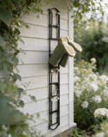 The Rotherfield Black 4 Pair Wall Mounted Boot Rack Mounted on an Exterior Garden Wall - Digital Illustration The Rotherfield Black 4 Pair Wall Mounted Boot Rack Mounted on an Exterior Garden Wall - Digital Illustration