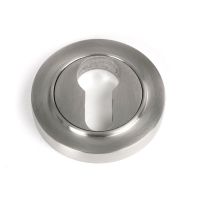 The Round Concealed Euro Keyhole Escutcheon in Satin Stainless Steel Shown on a White Background