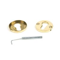 The Round Concealed Euro Profile Escutcheon - Aged Brass on a White Background Showing the Front and the Back The Round Concealed Euro Profile Escutcheon - Aged Brass on a White Background Showing the Front and the Back