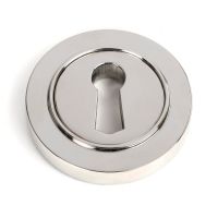 The Round Concealed Standard Keyhole Escutcheon in Polished Stainless Steel Shown on a White Background