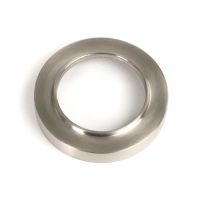 The Round Concealed Standard Keyhole Escutcheon in Satin Stainless Steel Showing Just the Backplate on a White Background