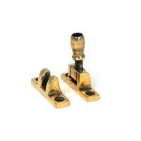 The Rounded Brighton Sash Square Window Fastener - Aged Brass on a White Background The Rounded Brighton Sash Square Window Fastener - Aged Brass on a White Background