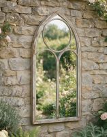 The Rustic Arched Wall Mirror on a Traditional Stone Wall in a Flowery Garden - Digital Illustration The Rustic Arched Wall Mirror on a Traditional Stone Wall in a Flowery Garden - Digital Illustration