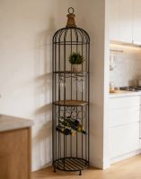 The Rustic Bird Cage Shelving Wine Rack Unit placed in the Corner of. Living Room with Wine Bottles and Glasses - Digital Illustration The Rustic Bird Cage Shelving Wine Rack Unit placed in the Corner of. Living Room with Wine Bottles and Glasses - Digital Illustration
