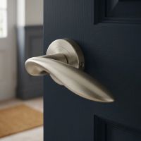 The Satin Nickel Elegant Leaf Lever Round Rose Door Handle on a Door Leading to an Entrance Lobby of a Home - Digital Illustration