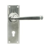 The Satin Stainless Steel Sleek Architectural Lever Lock Door Handle Set on Plain Backplate The Satin Stainless Steel Sleek Architectural Lever Lock Door Handle Set on Plain Backplate