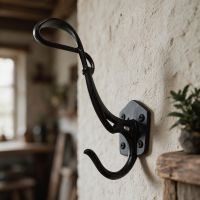 The "Schubert" Iron Coat Hook Shown Mounted on a Wall in a Traditional Home - Digital Illustration The "Schubert" Iron Coat Hook Shown Mounted on a Wall in a Traditional Home - Digital Illustration